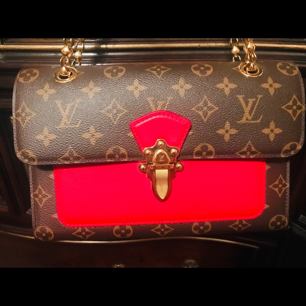 Authentic Louis Vuitton Victoire Bag